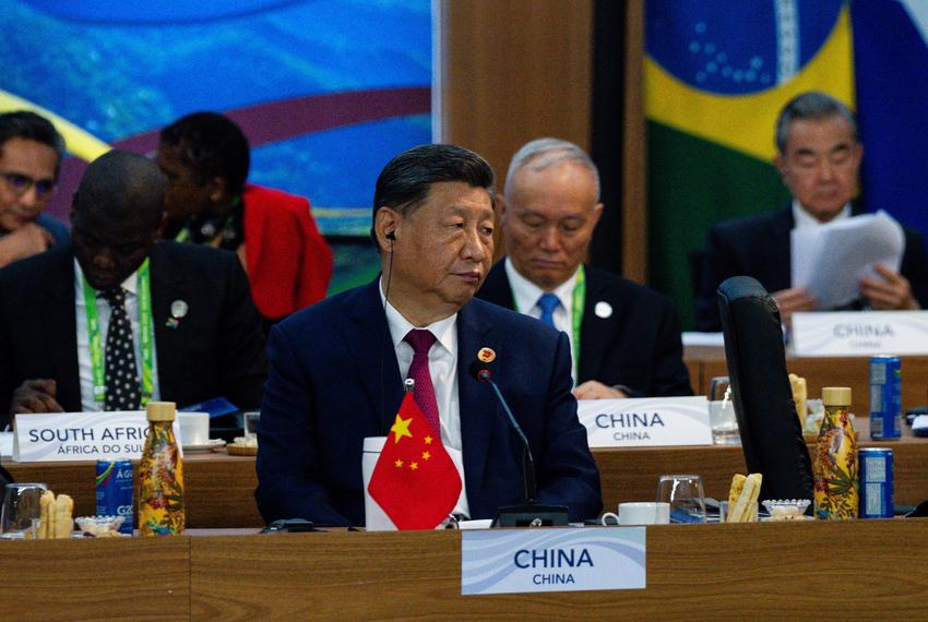 Chinese President Xi Jinping listens as U.S. President Joe Biden, not pictured, delivers remarks during an event launching the Global Alliance Against Hunger and Poverty at the G20 Summit at the Museum of Modern Art in Rio de Janeiro, Brazil on Monday, Nov. 18, 2024.