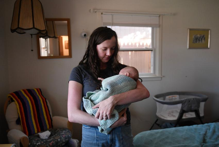 Kelly Johnson hold her six-week-old son, John, as seen Wednesday, April 9, 2025, in Lubbock. “Normal things that are hard [in postpartum], are hard,” Johnson says, “but been having that plus keeping an eye out on a measles outbreak.”